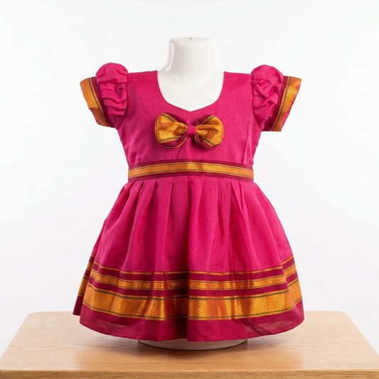 Traditional pink Paithani frock for baby girls with zari border and festive ethnic design