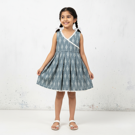 girl wearing grey cotton frock printed flared