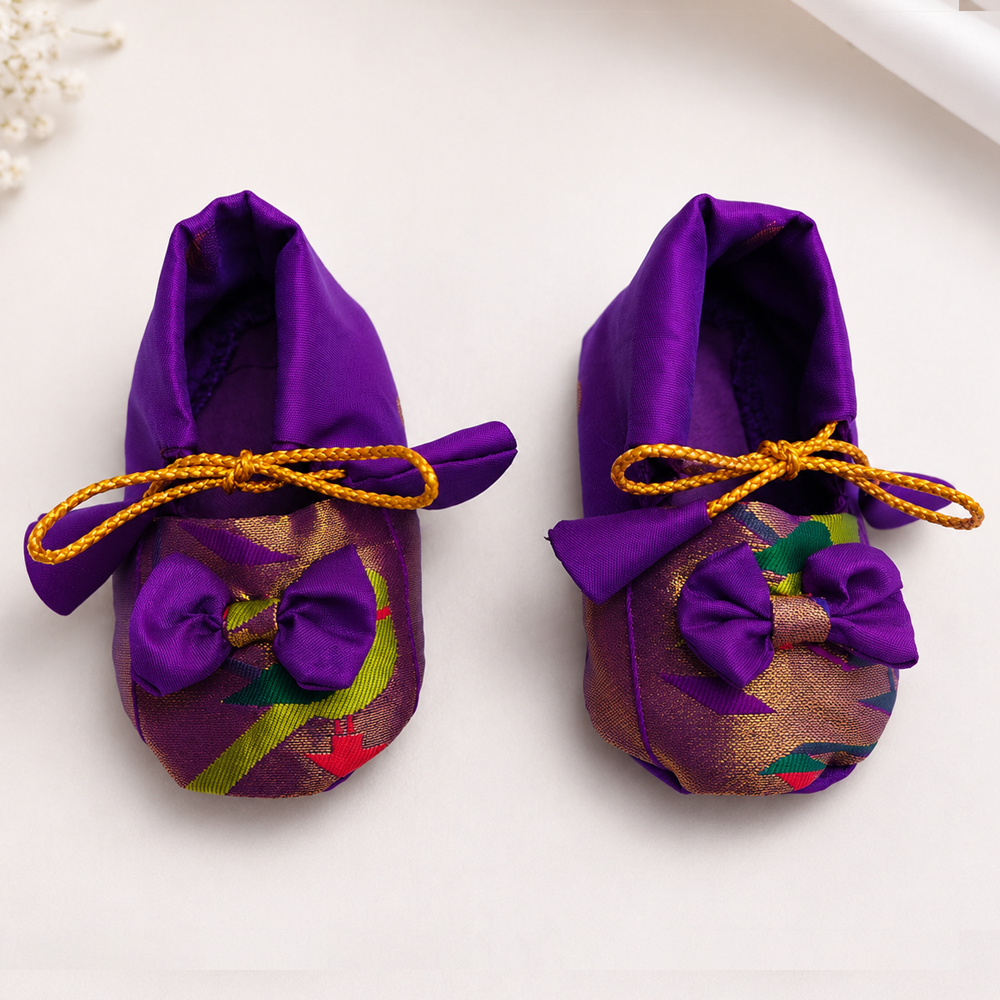 Purple Paithani baby booties with traditional Maharashtrian weaving and bow design