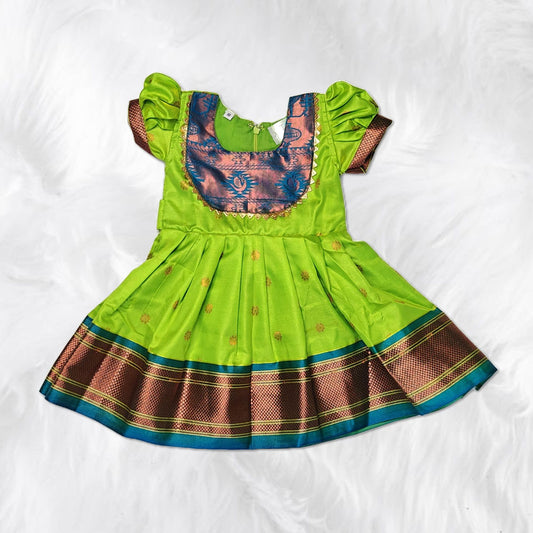 Ethnic traditional frock for girls in vibrant hues, designed for parties and weddings.